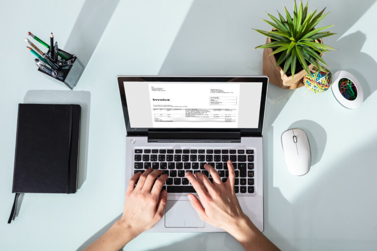 Businessperson Checking Invoice On Laptop Payment Invoice